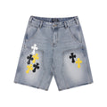 Light-Wash Denim Shorts features embroidered cross patches