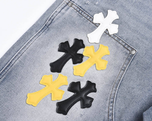 Light-Wash Denim Shorts features embroidered cross patches